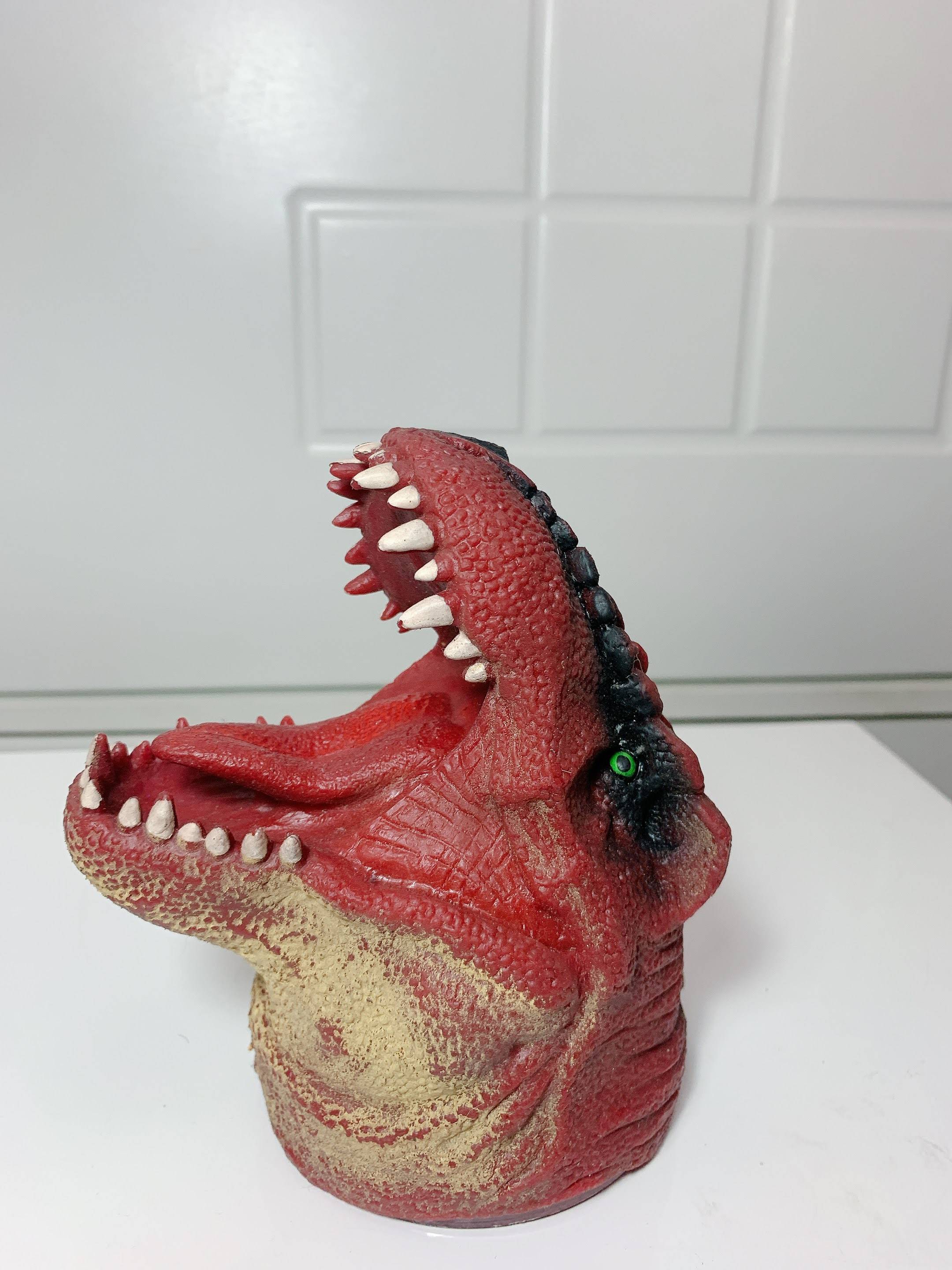 Dinossauro busto marrom