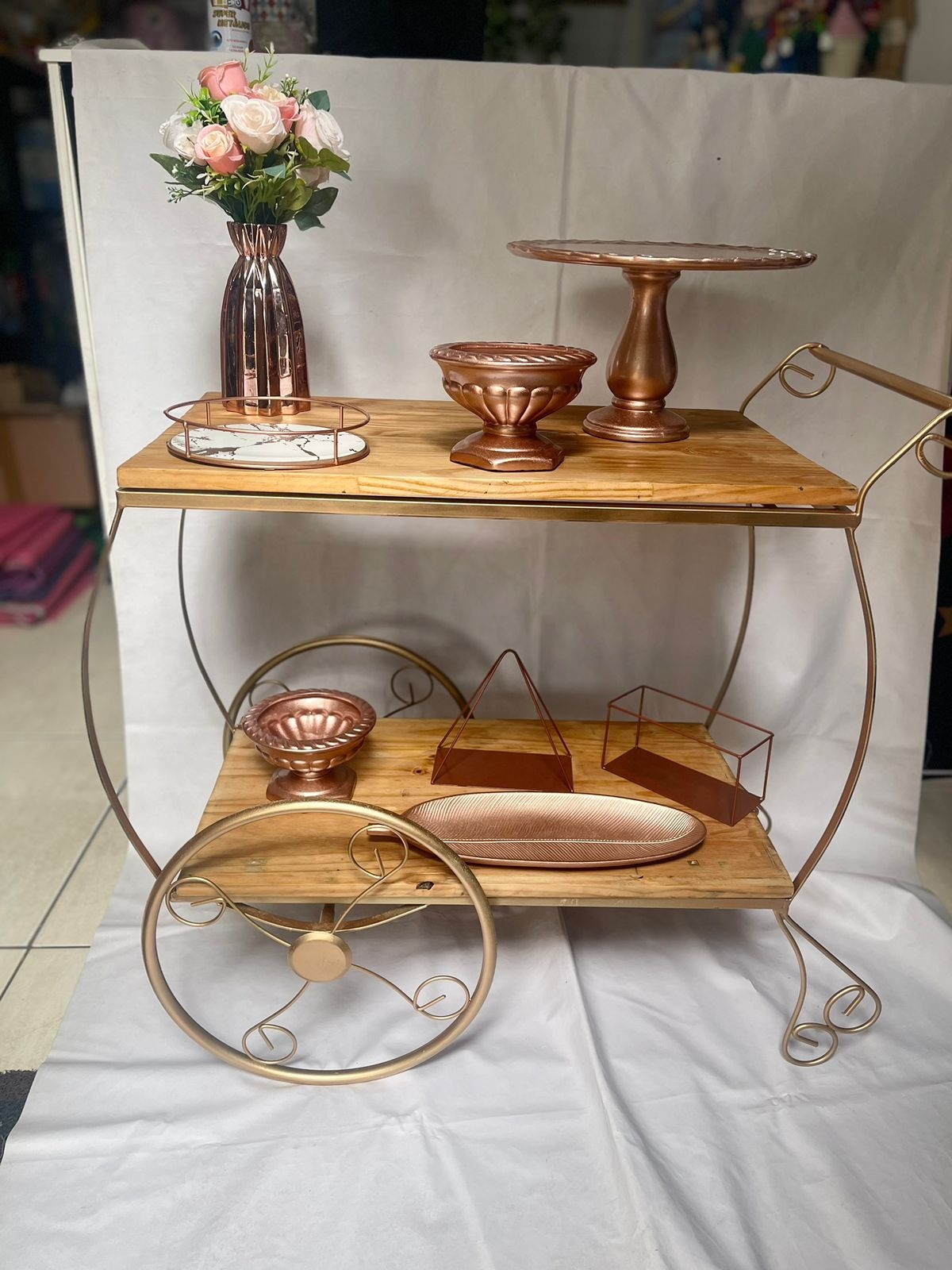 Carrinho com peças rose gold